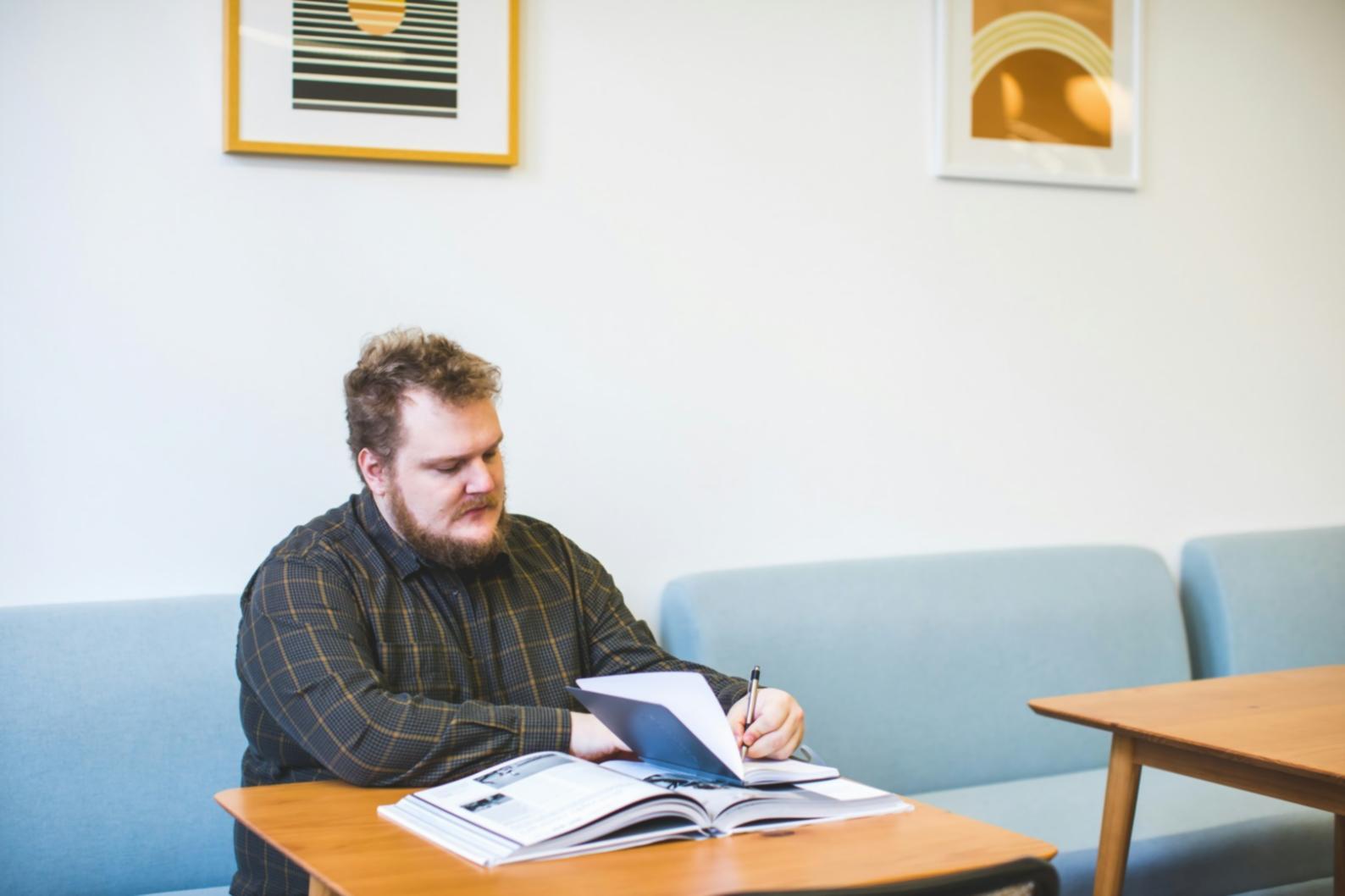 Modern financial planning workspace with educational materials and resources