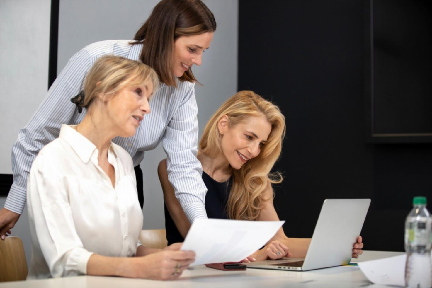 Students working collaboratively on financial planning exercises