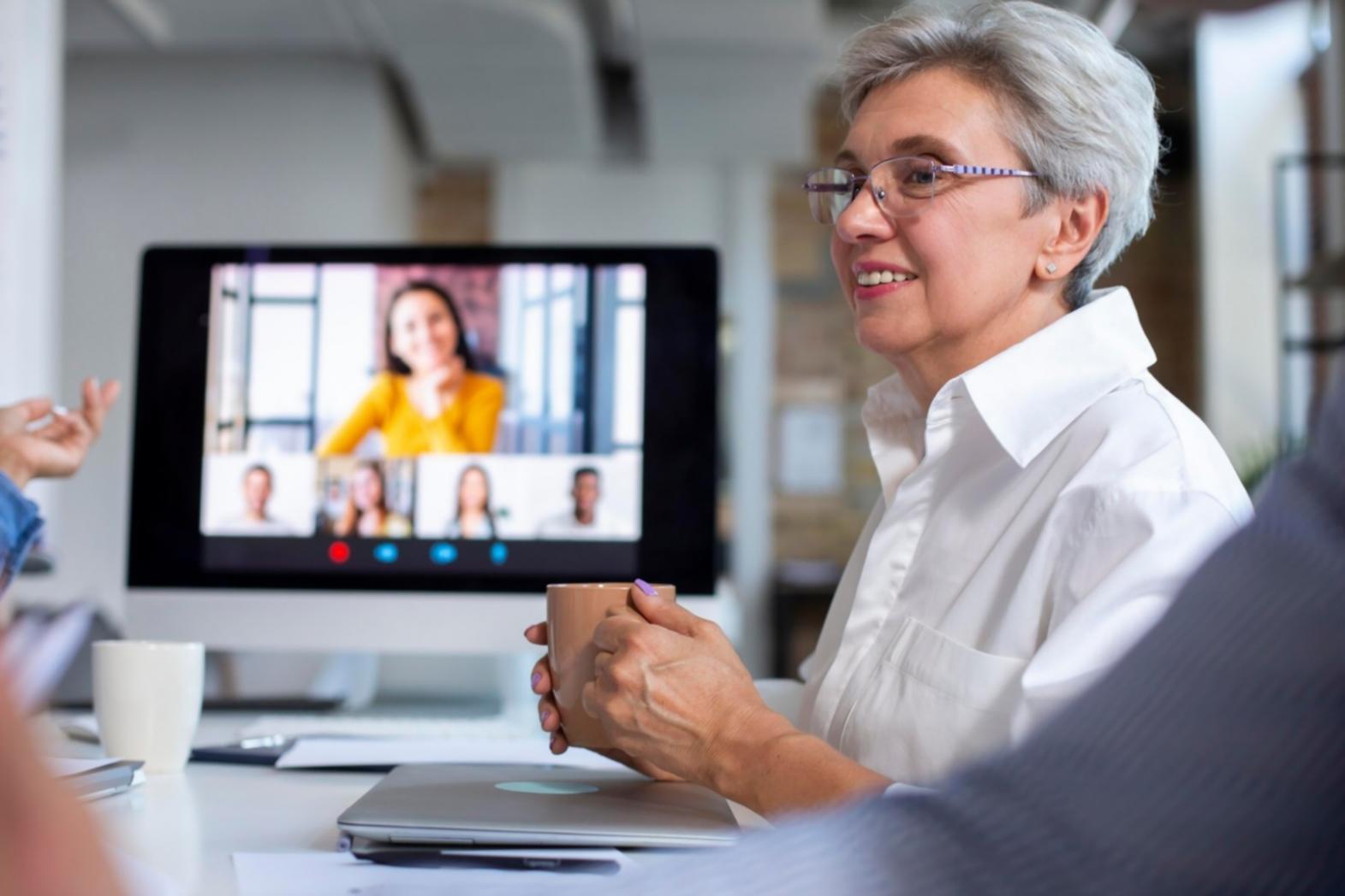 Business professionals reviewing financial documents and charts